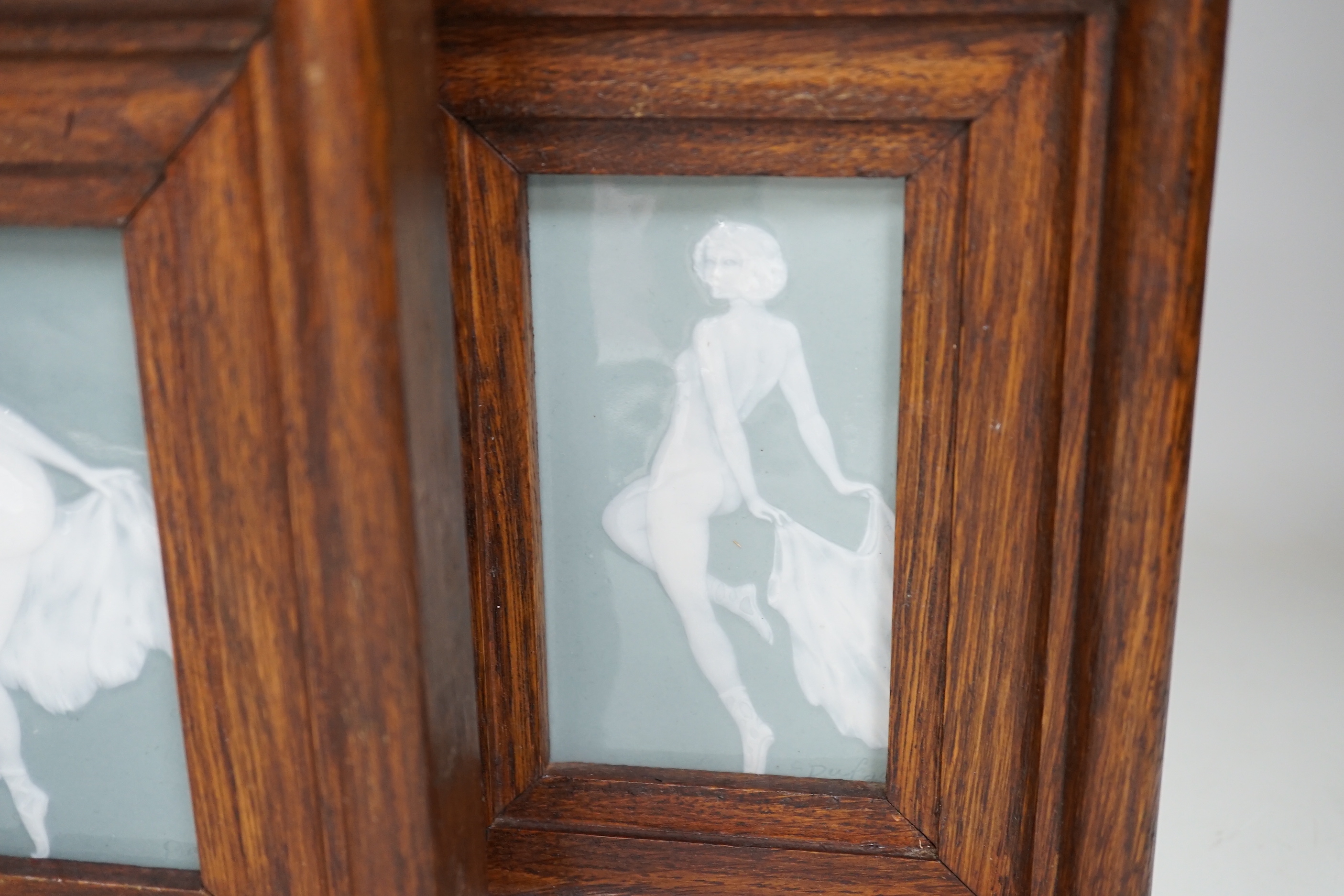 Two French pate-sur-pate panels of dancers, each signed Dufaud, framed, the largest overall 20cm x 17cm